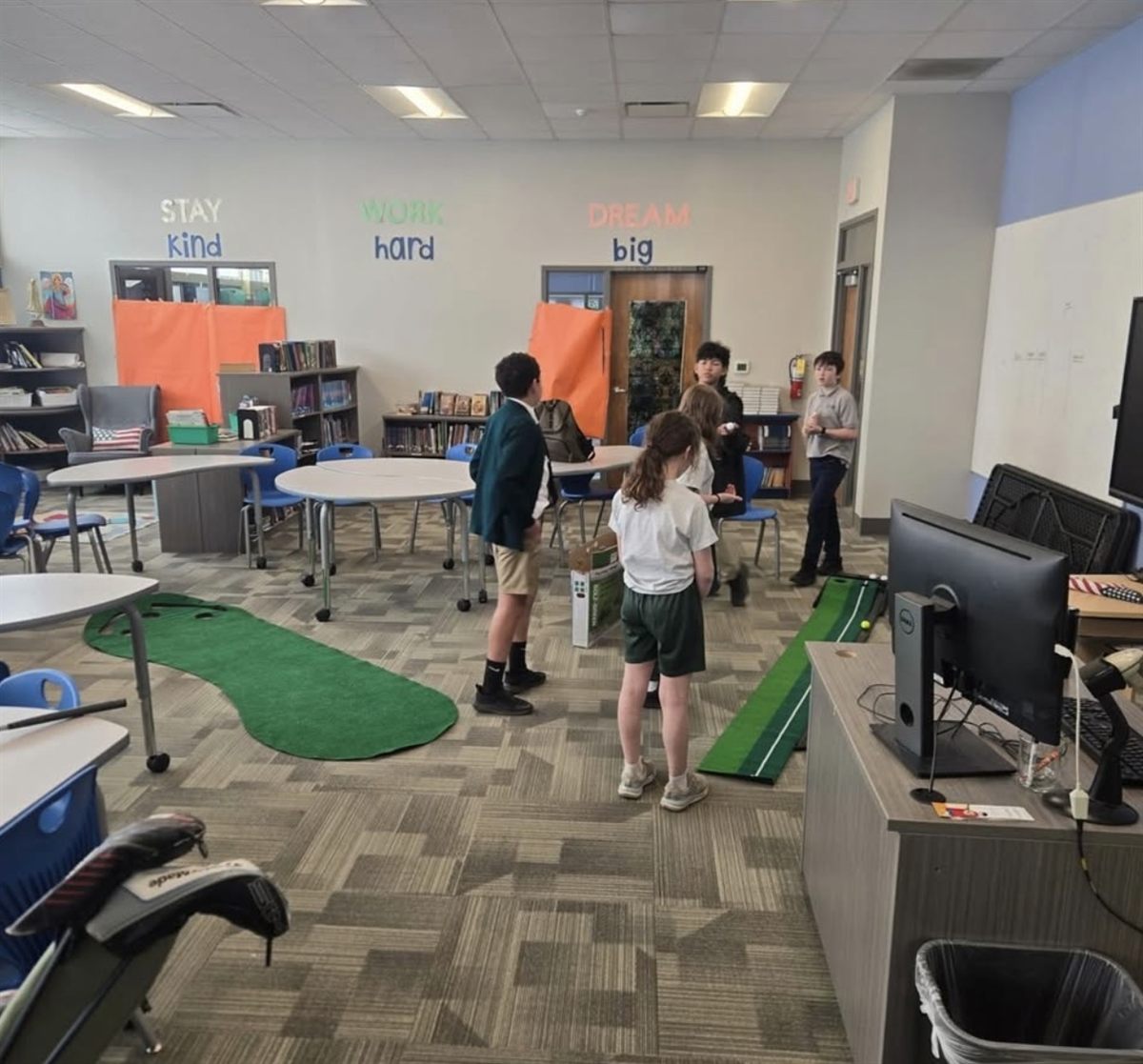Golf Club students practicing their putting